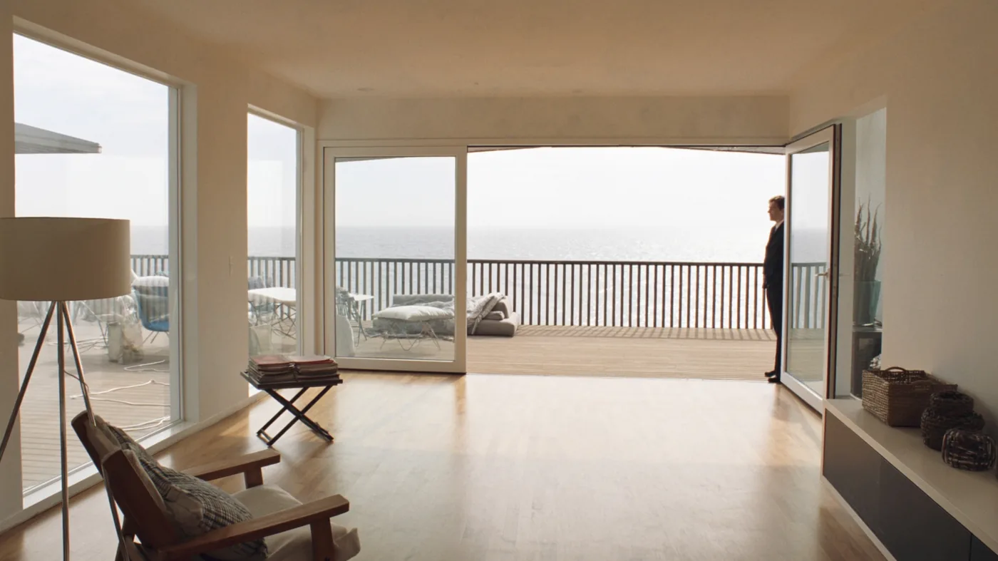 Bright living room with new floor-to-ceiling replacement windows
